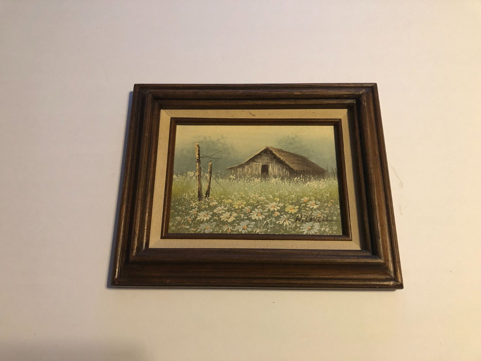 Vintage barn in field of wild flowers oil on board painting signed W. LOVELL