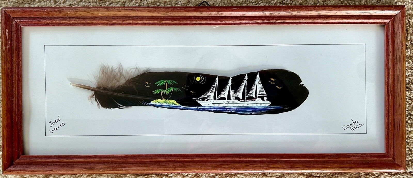 Costa Rico Sailboat/Schooner Painting on a Feather by Jose Garro Framed Art 17”