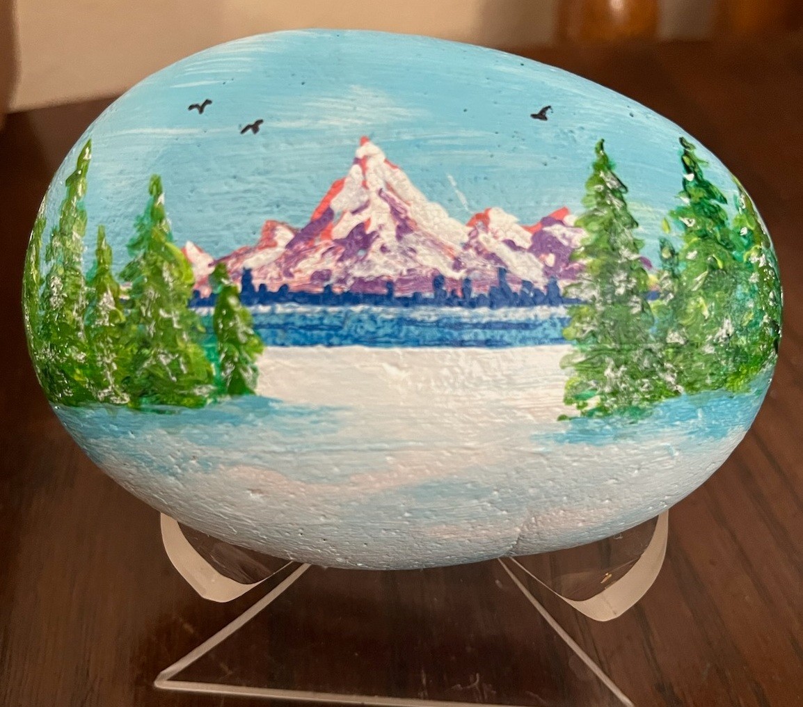 Painted Rock, Snowy Mountain Scene. 3 3/4″ wide, acrylic paint