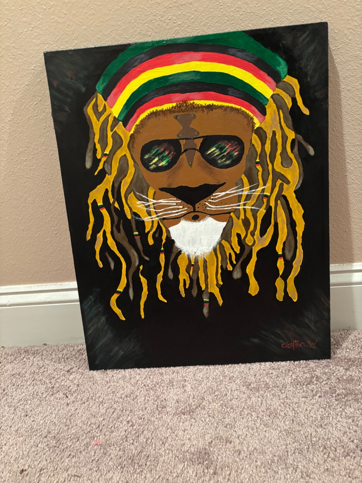 A Rasta Lion that’s hand painted on canvas original artwork