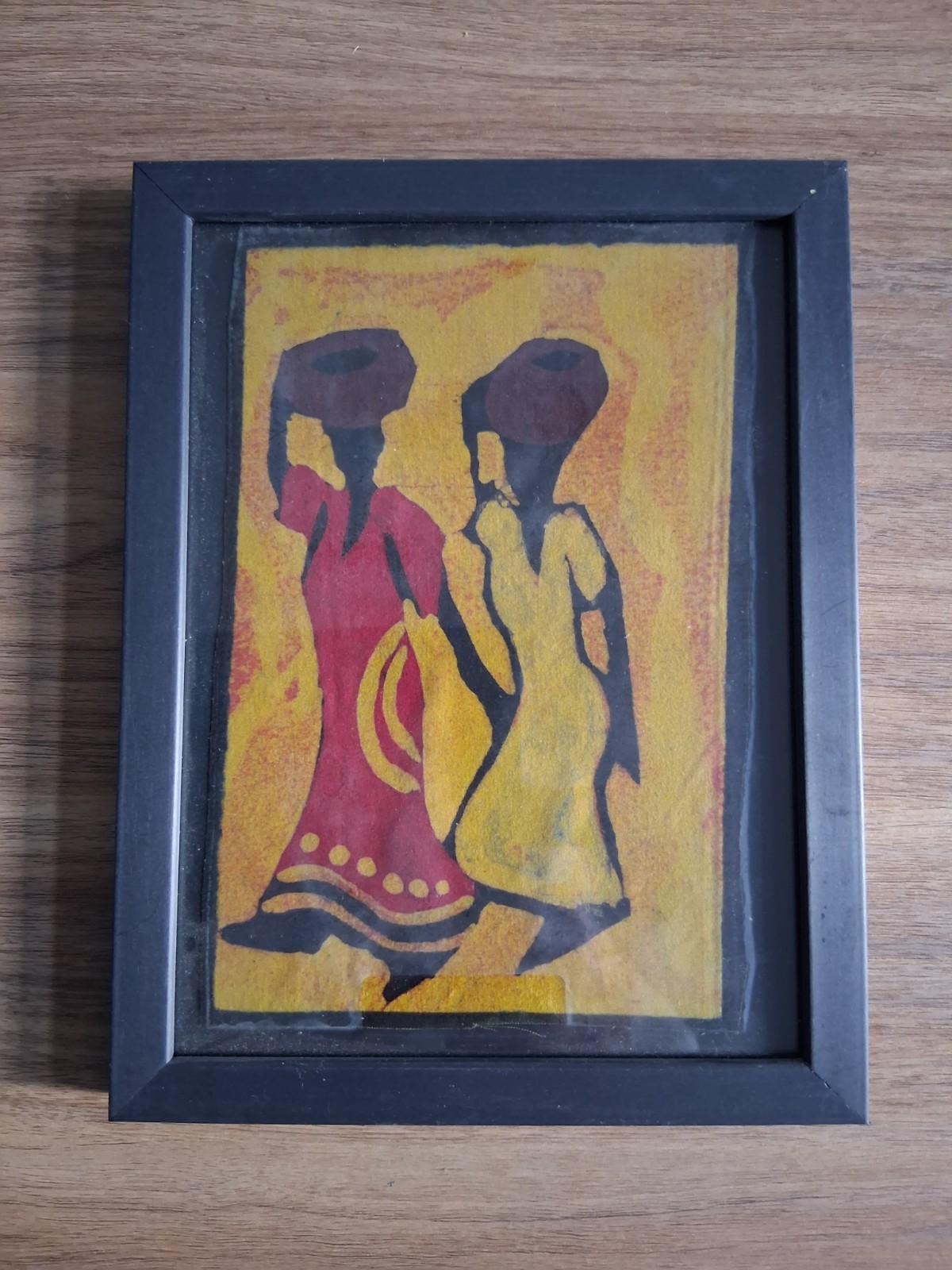 African Artwork Influence: Two Stylized Figures Depicting A Walk for Water.