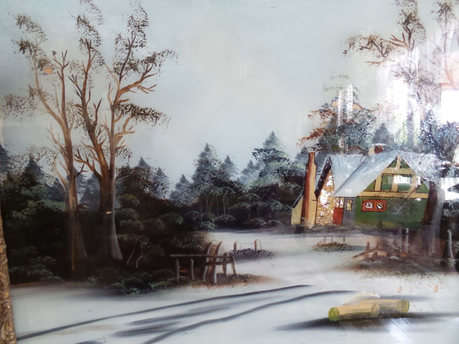 ANTIQUE SNOW SCENE REVERSE PAINTING FRAMED IN ANTIQUE WOOD GESSO FRAME