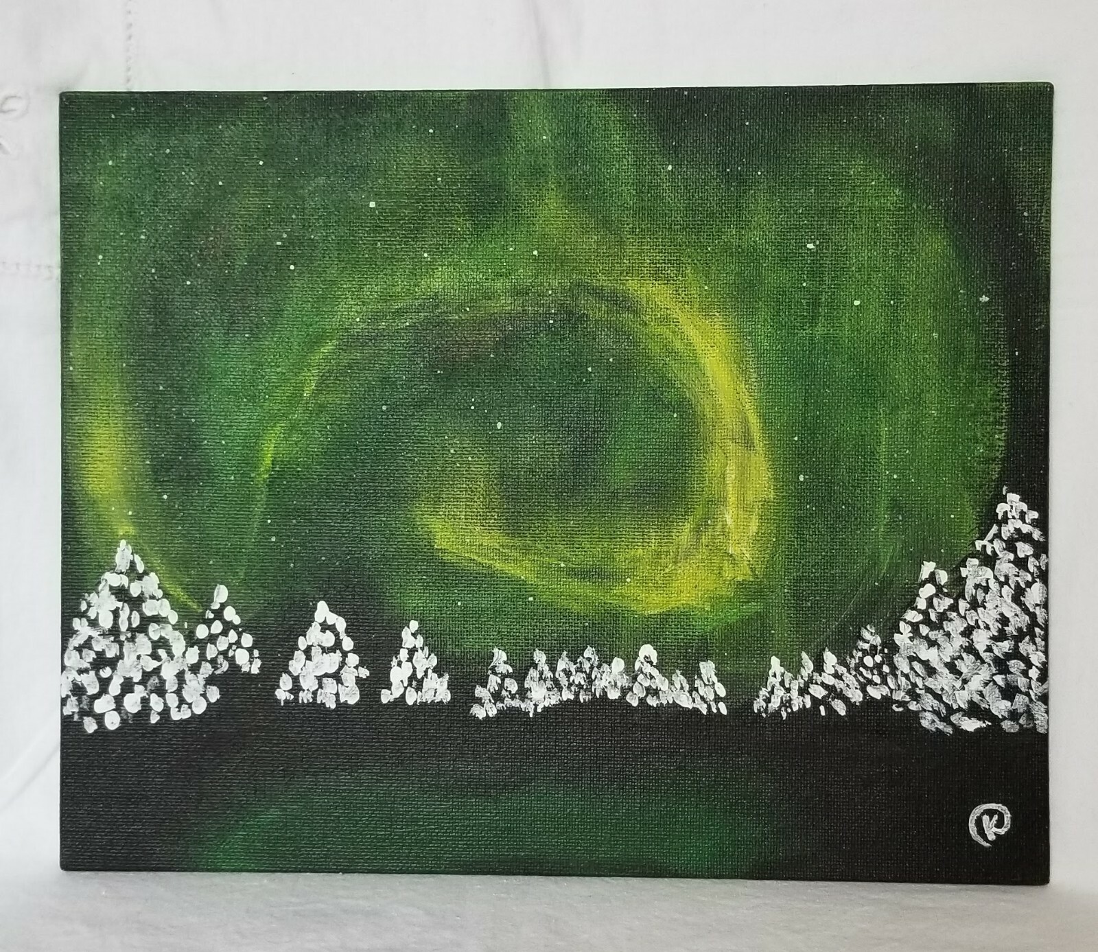 acrylic painting on an 8×10 canvas board of the aurora borealis 