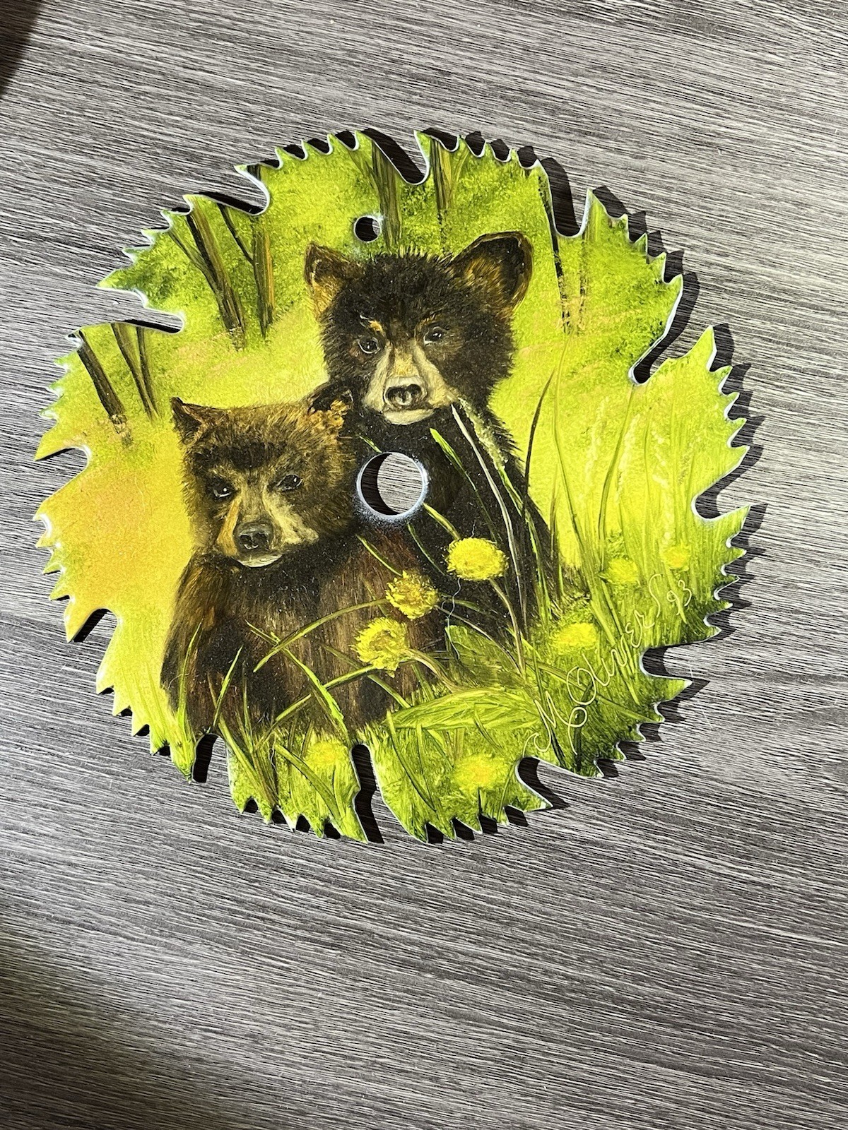 Vintage 7 inch saw blade painting of bear cubs, signed by local artist 1993