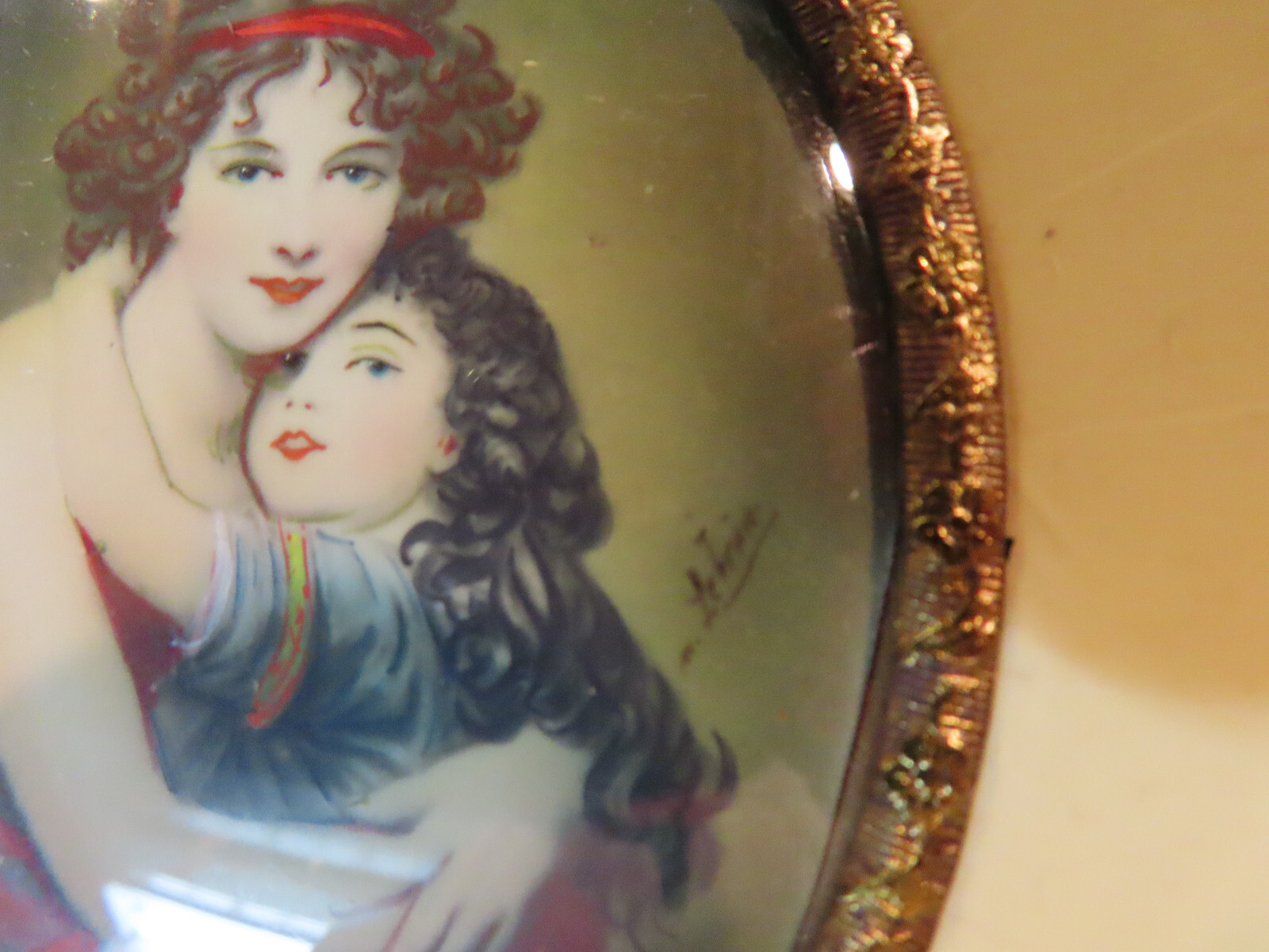 Miniature signed hand painted portrait on celluloid in celluloid frame, vintage