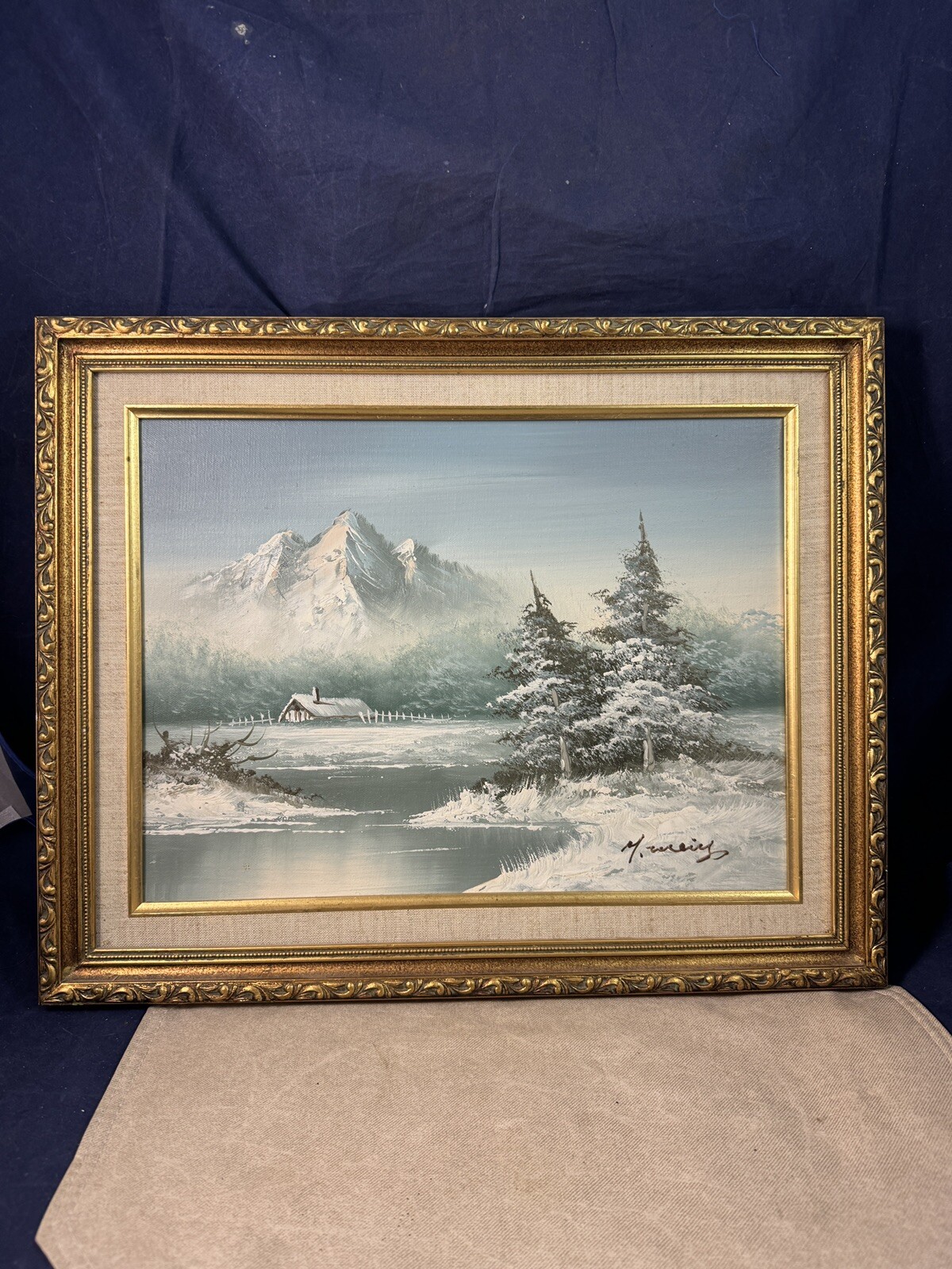 Winter Scene Painting -Snow covered Cabin with mountains, water and trees Signed