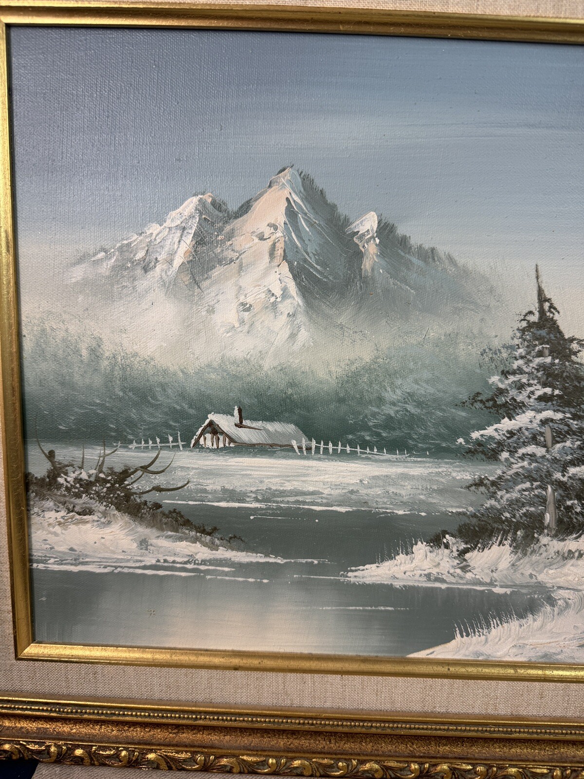Winter Scene Painting -Snow covered Cabin with mountains, water and trees Signed