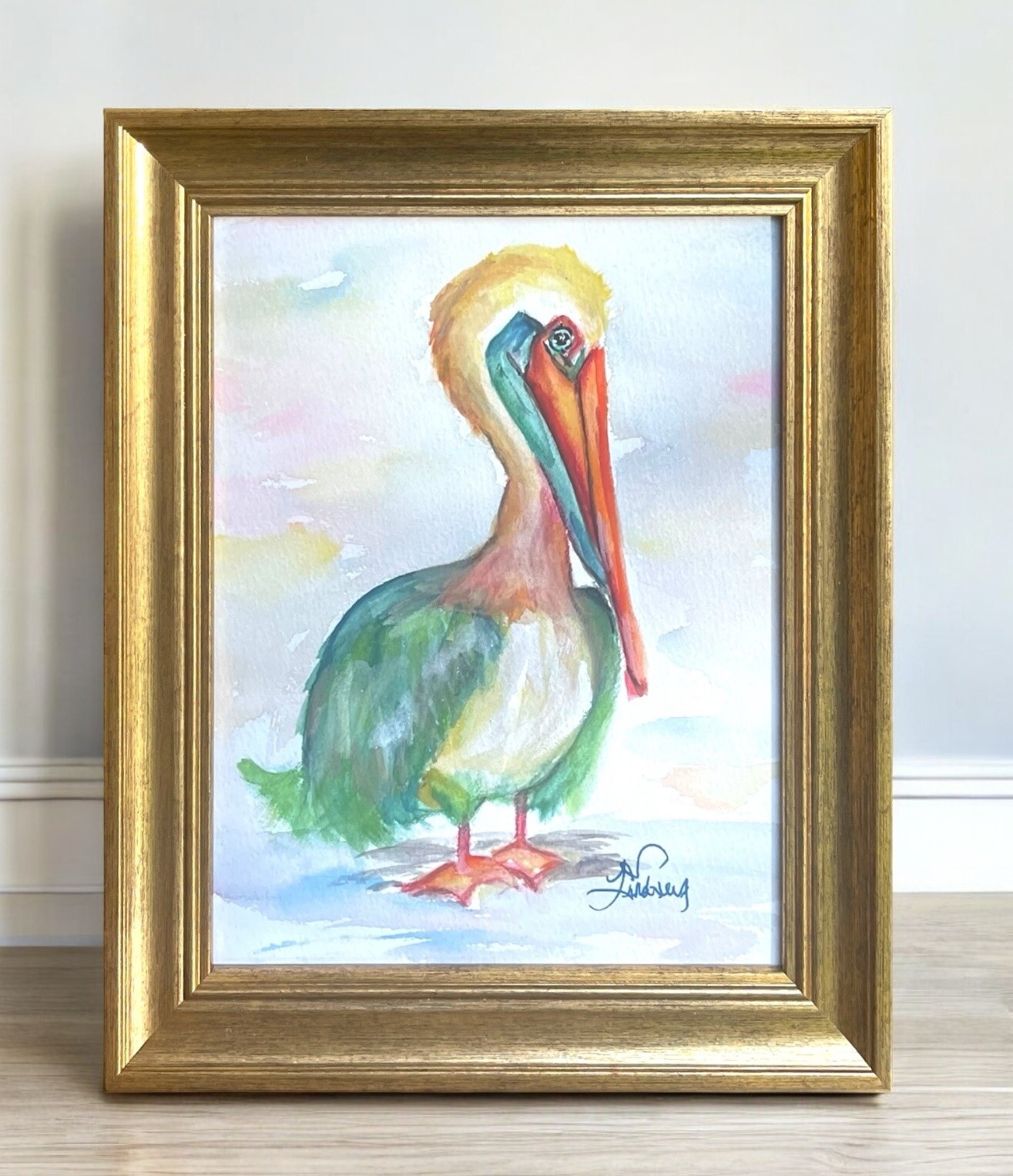 Colorful Pelican watercolor print of a painting framed, has a stand & hinge