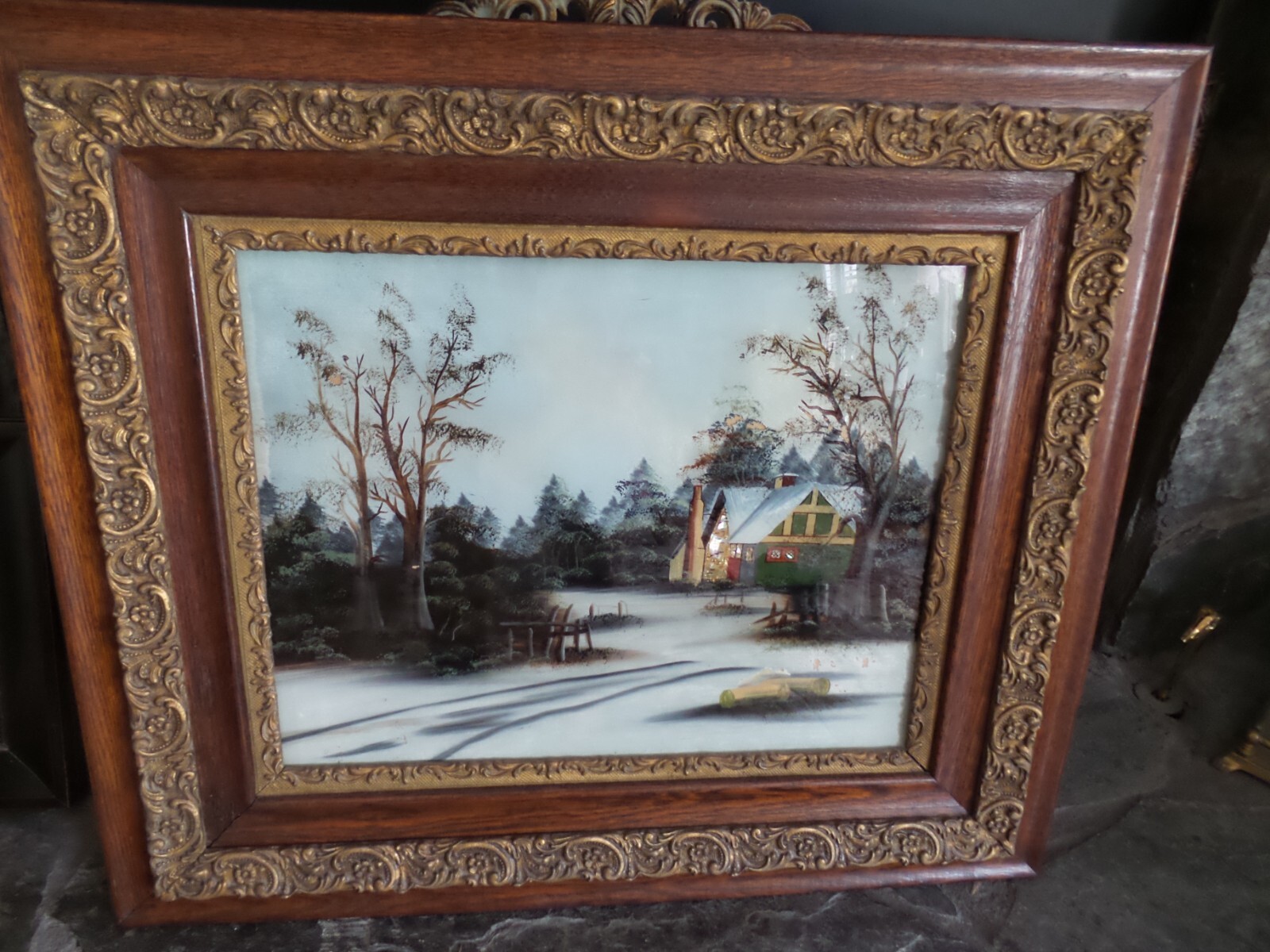 ANTIQUE SNOW SCENE REVERSE PAINTING FRAMED IN ANTIQUE WOOD GESSO FRAME