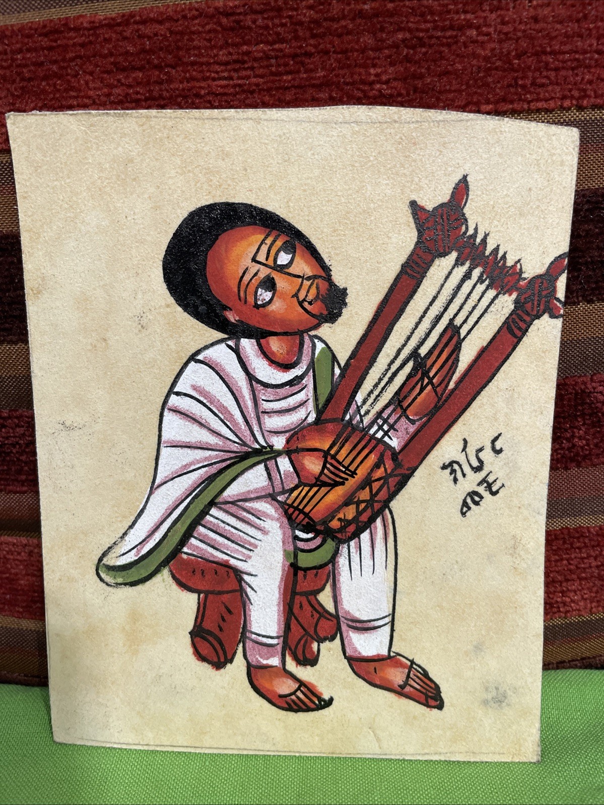 Ethiopian Painting on Leather ~5 x 6″ ( Green Shirt)
