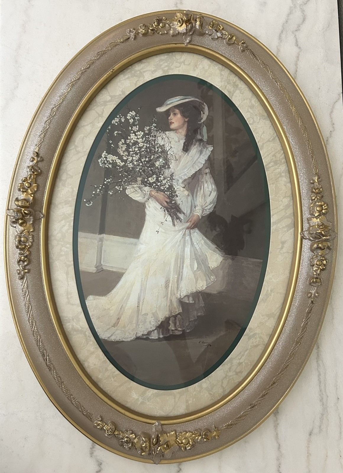 Elegant vintage oval-framed portrait featuring a Victorian-style lady
