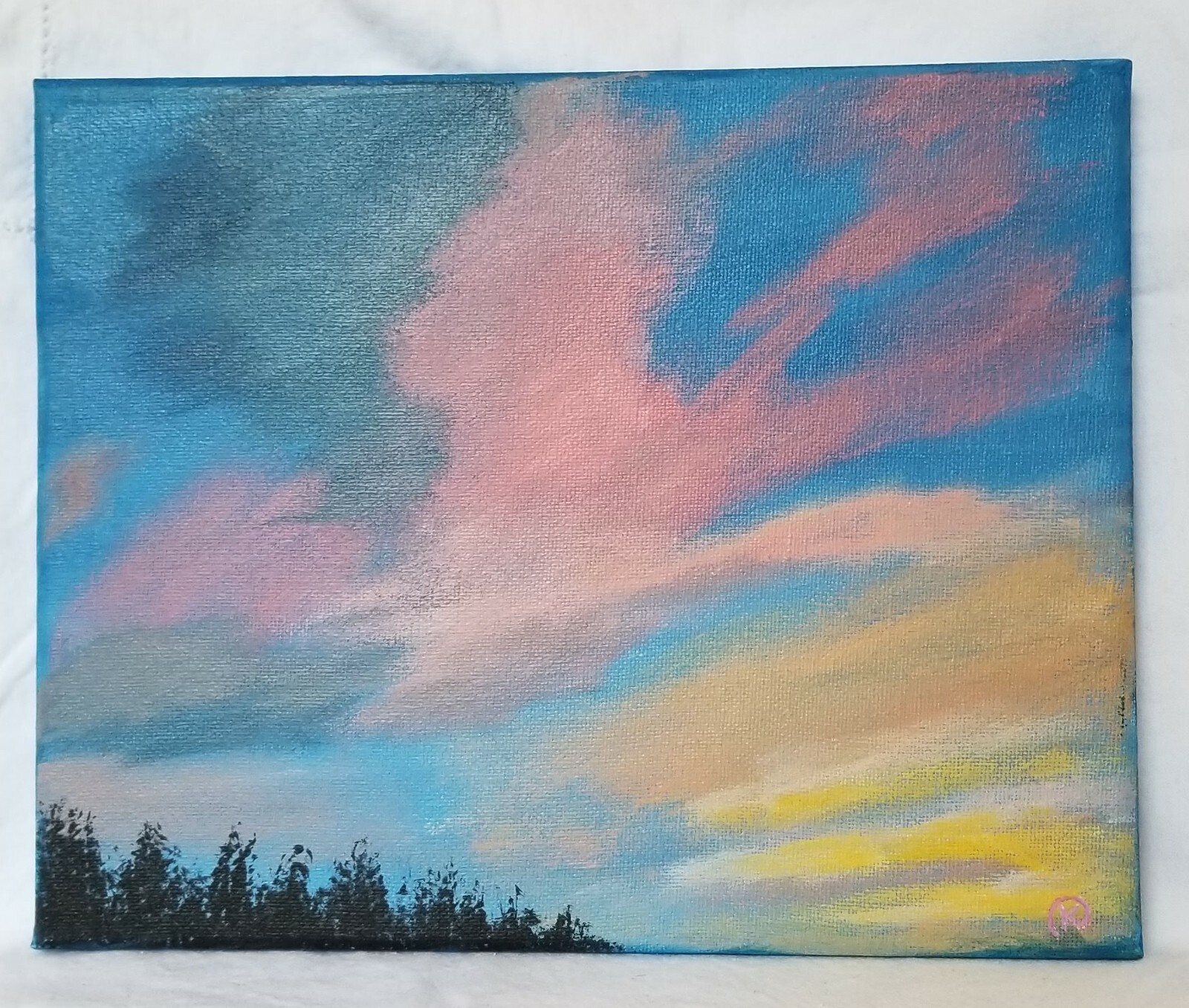 acrylic painting on an 8×10 canvas of colorful clouds in the sunset sky