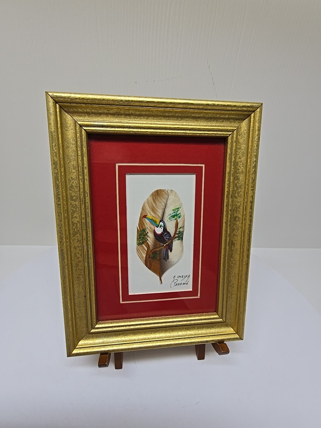 Hand-Painted Framed Artwork Featuring a Toucan on a Feather Framed, Signed D37