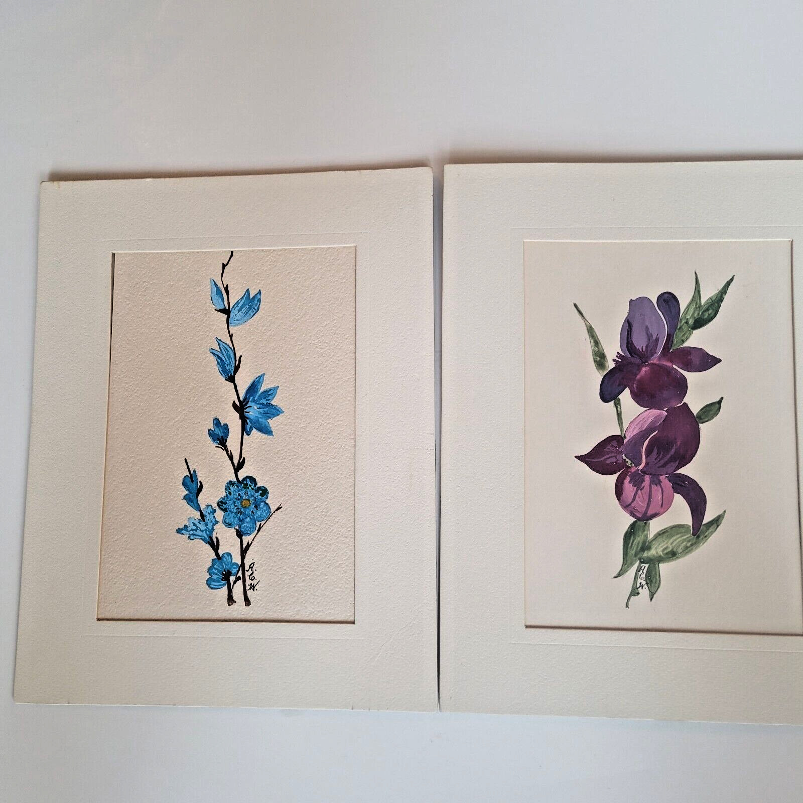 Two Flower Paintings Artist Signed Purple Iris Blue Branch Matted 7×9 Inches