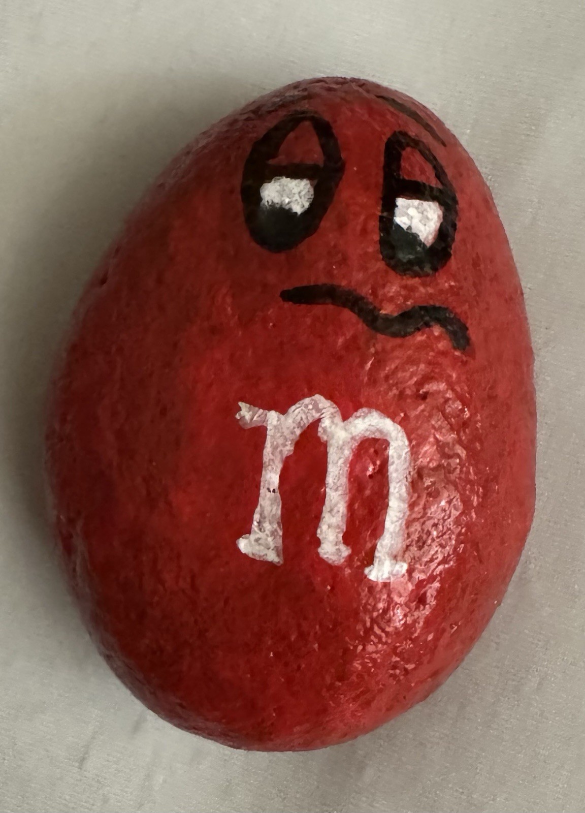 Wounded M&M Red Painted Rock