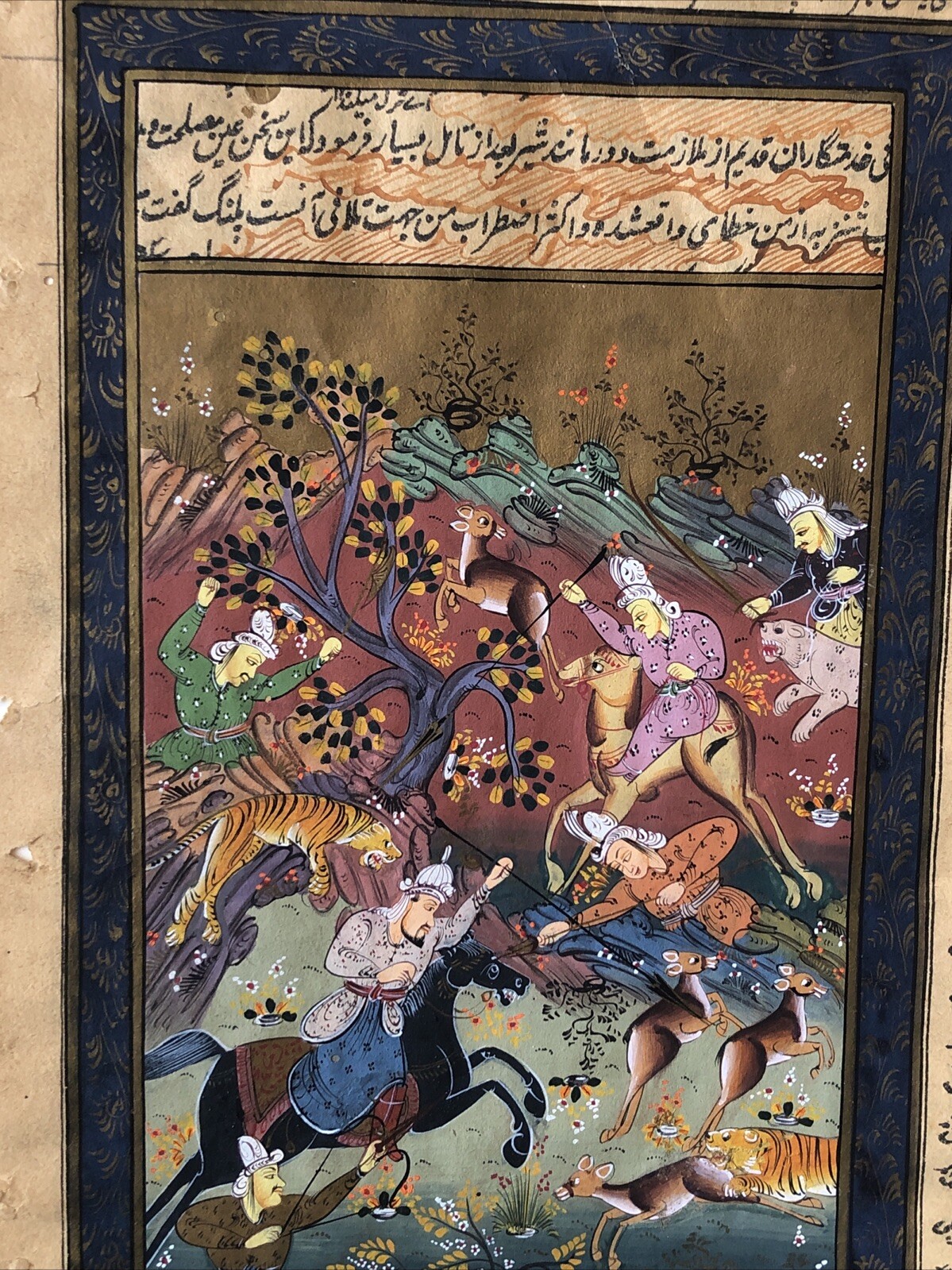 Painting from 17th century. Indo-Persian manuscript with hunting scene.