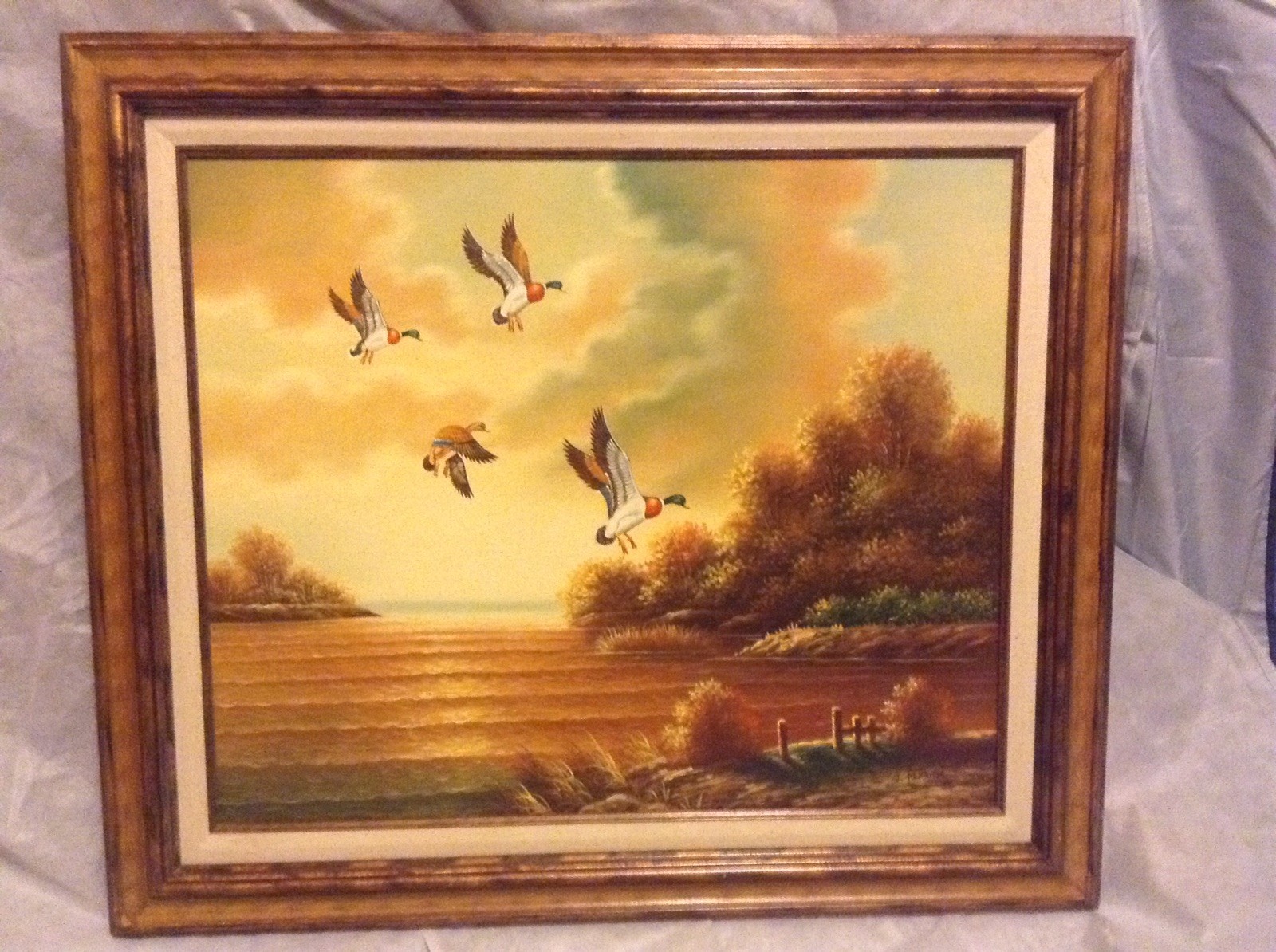«Mallard ducks flying over Lake» oil painting on canvas By J. Perrine