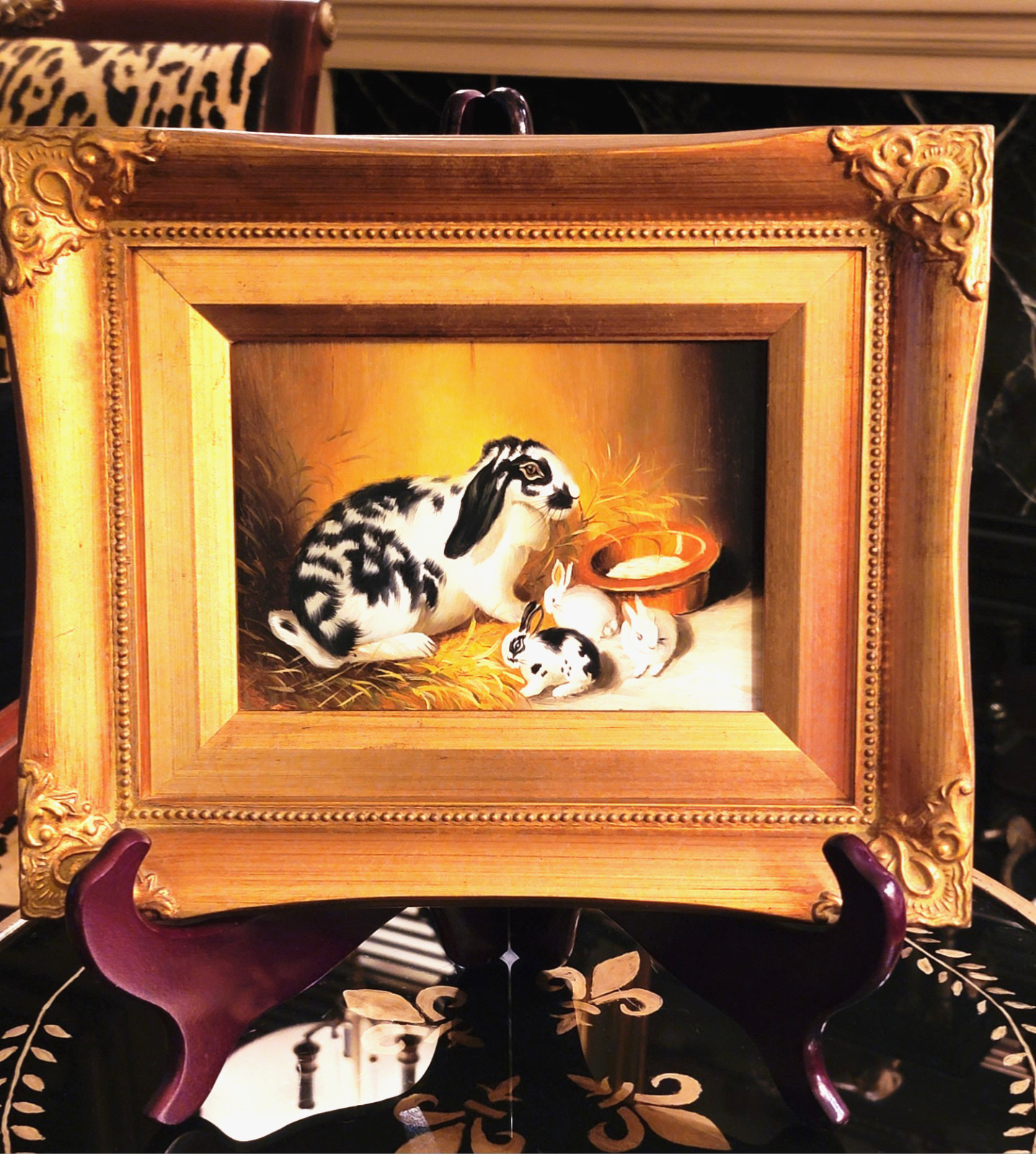 GILT FRAMED OIL ON BOARD OF A BLACK & WHITE RABBIT WITH 3 KITS, 11.5» X 9.25»