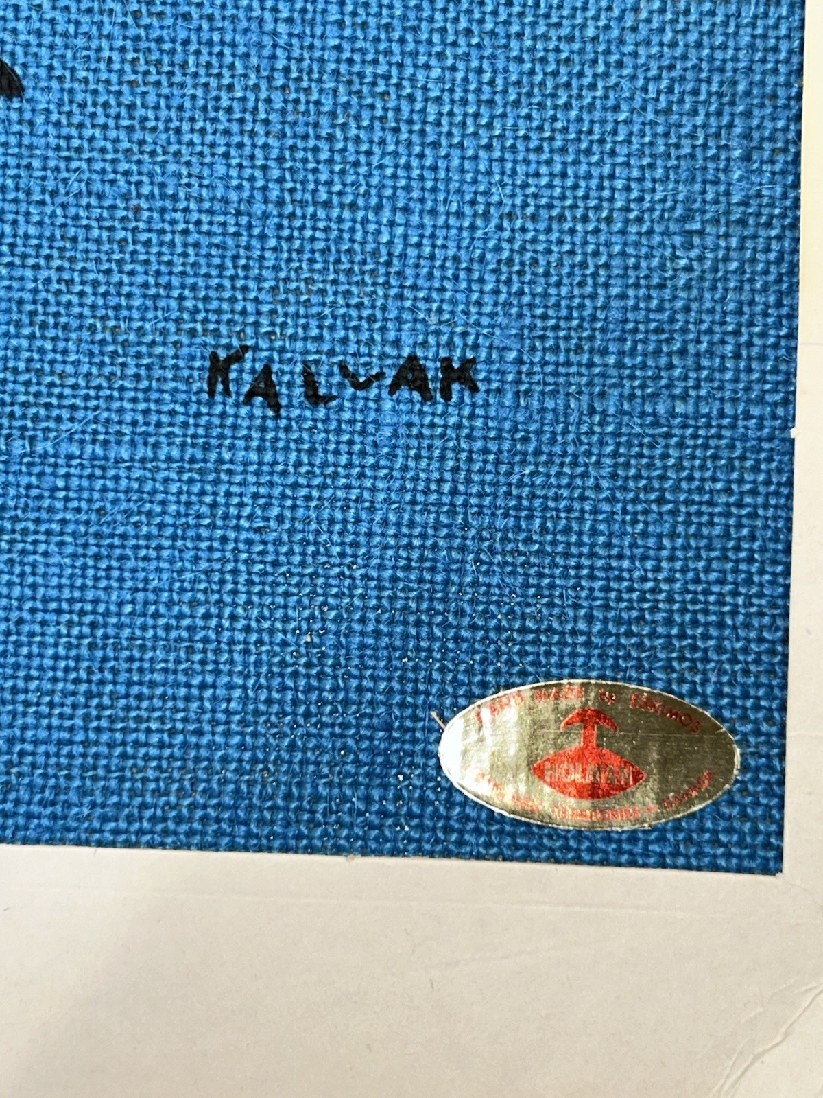 (Helen) Kalvak, Inuit art fishing scene with Salmon on Blue burlap c.1980 16×13”