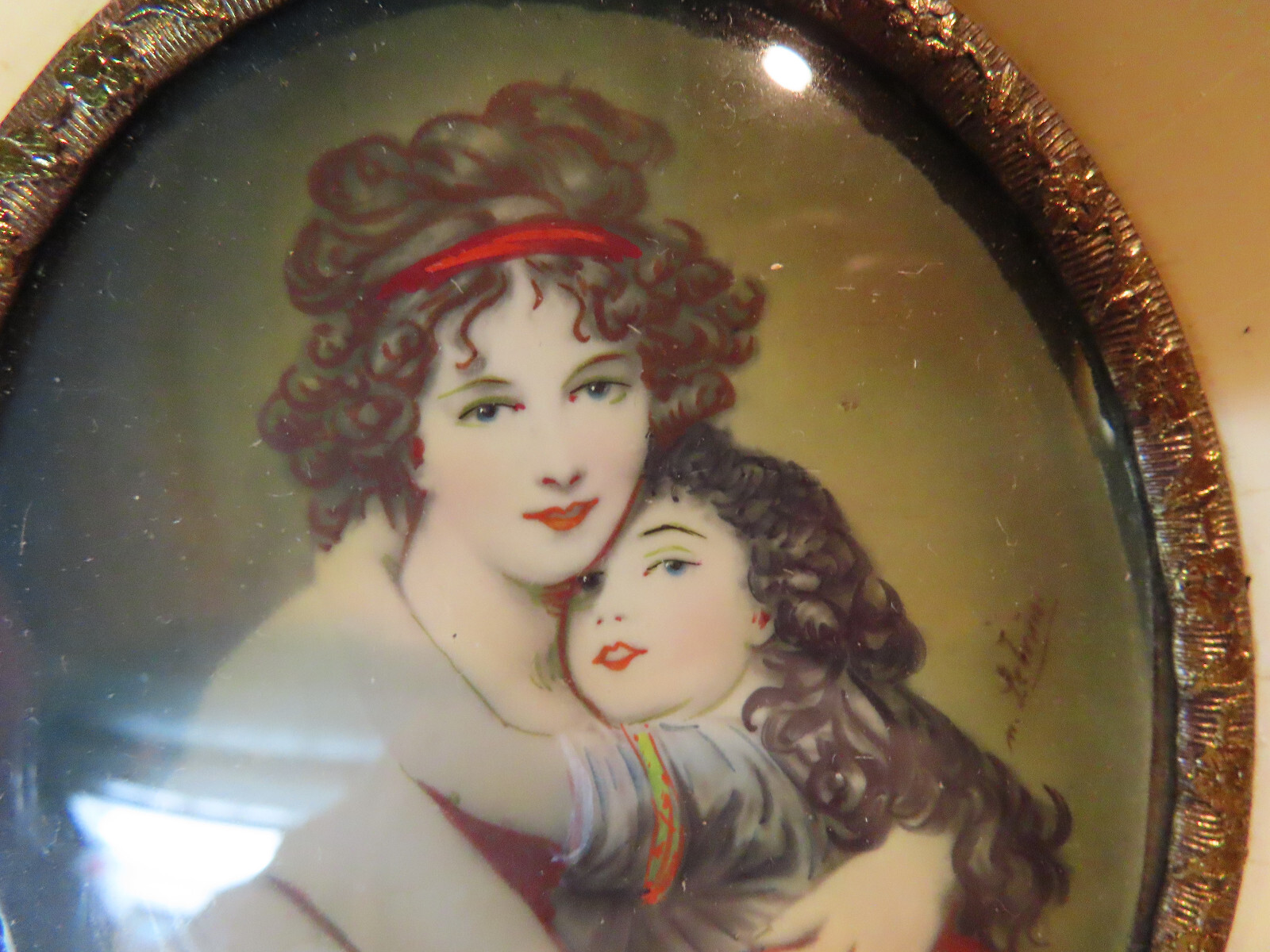 Miniature signed hand painted portrait on celluloid in celluloid frame, vintage