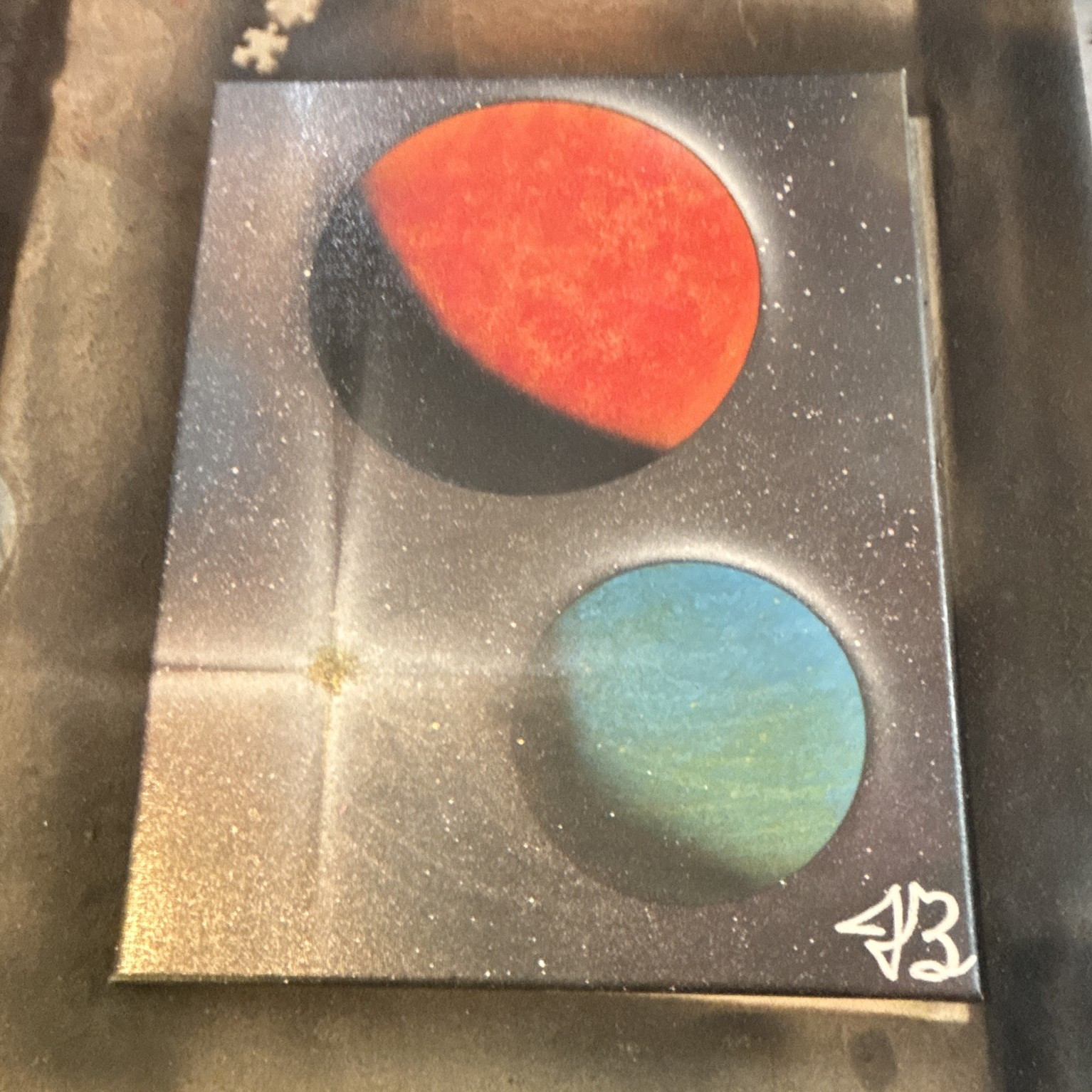 Custom Spray paint art Space planets: Red, Orange, Green, And blue. signed.