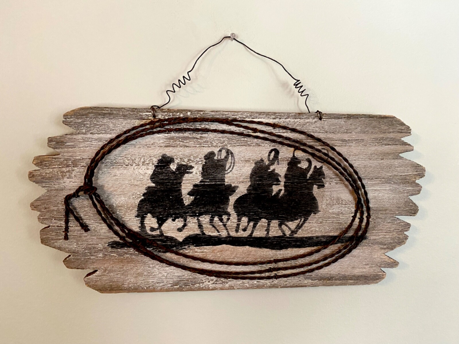 Folk art «Cowboys, Round Em Up» wooden hand painted, wire lariat 16″ x 7″
