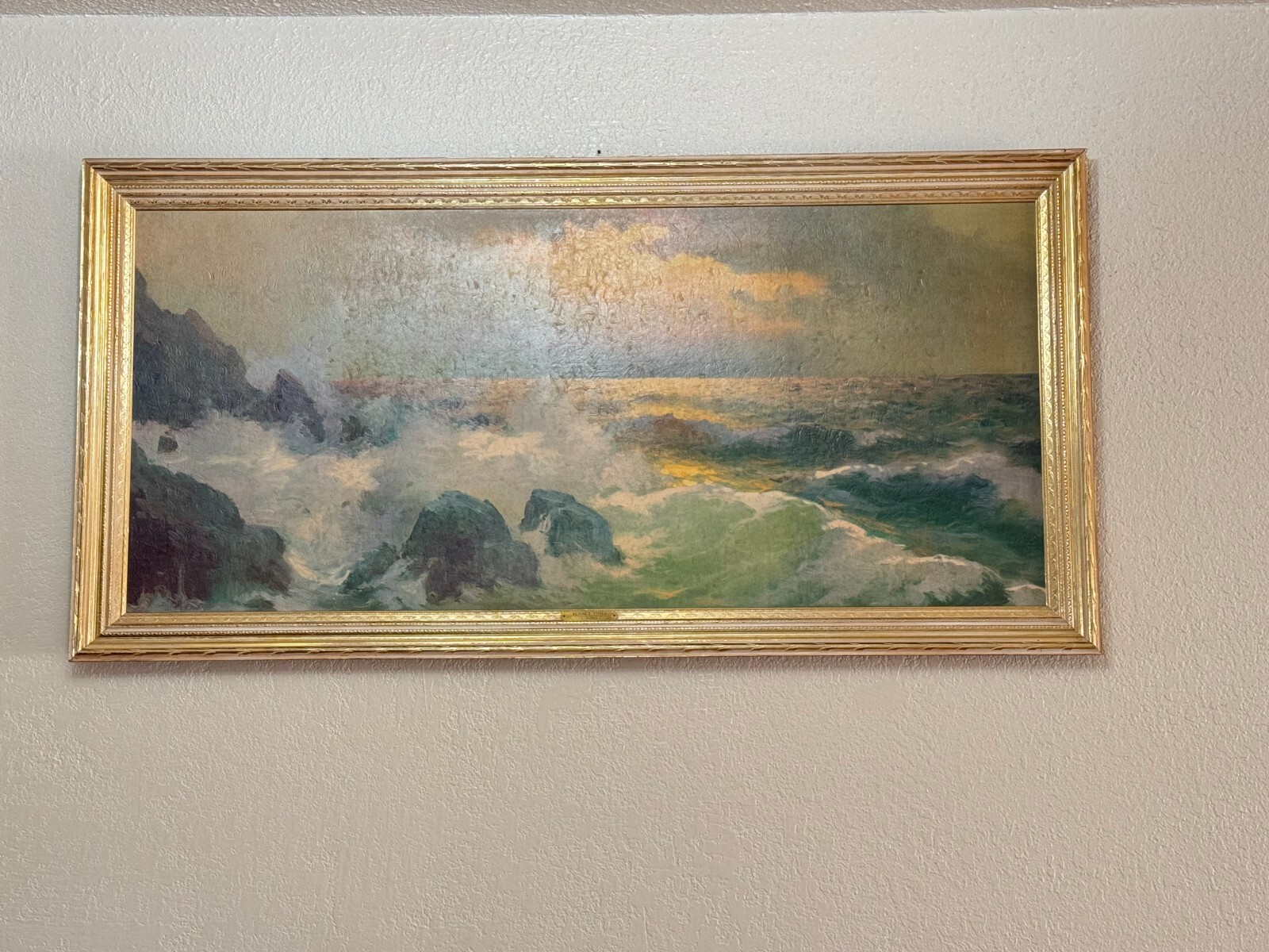 C. Rossi’s painting, Sunset Tides, showcases vibrant golden yellow, orange, and
