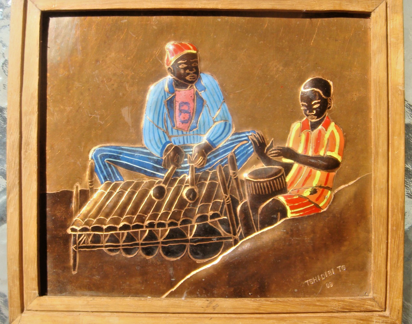 African Relief painting on copper signed by the Congolese artist Guycha Tshidibi