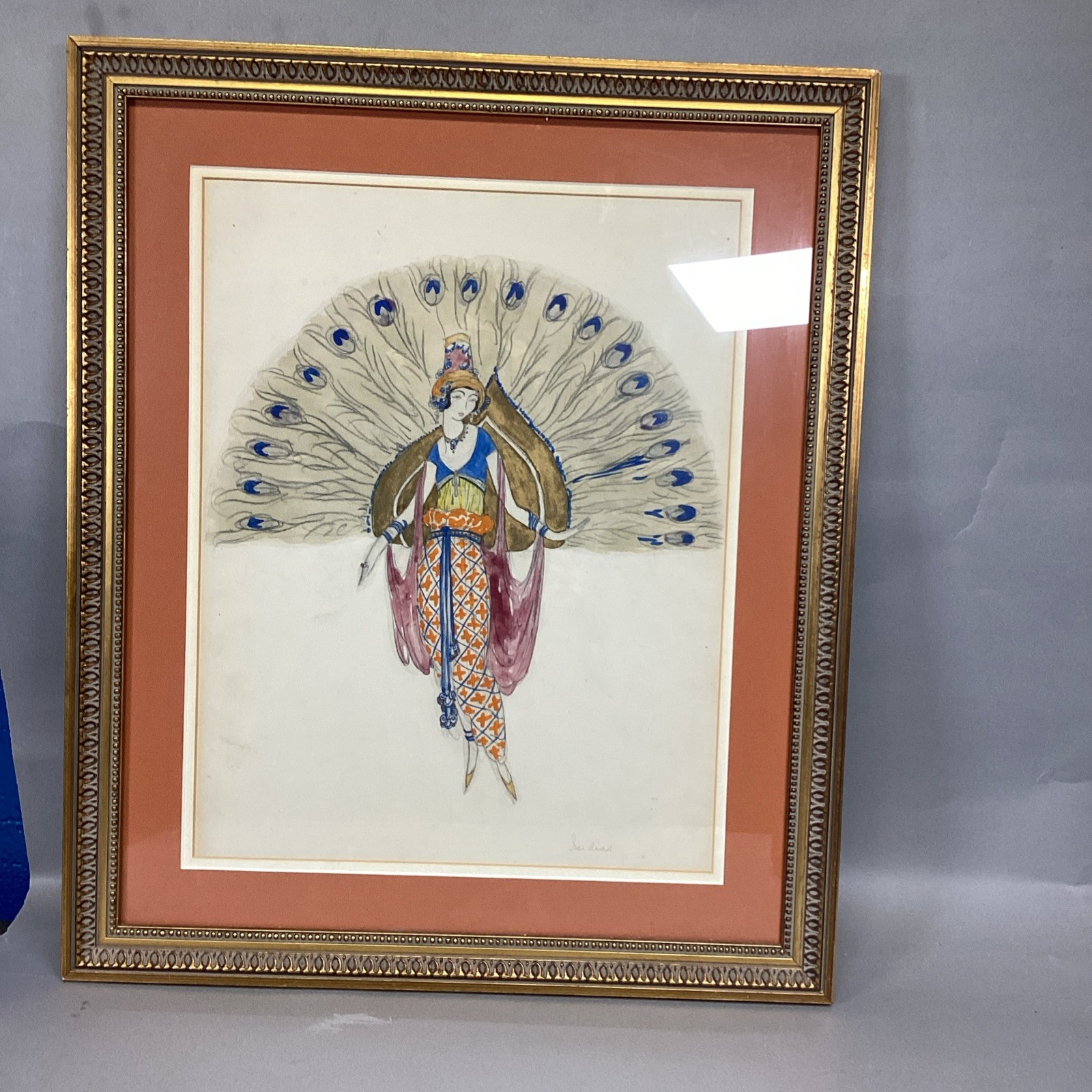 Woman With Peacock Feathers Framed Art – 23×19.5”