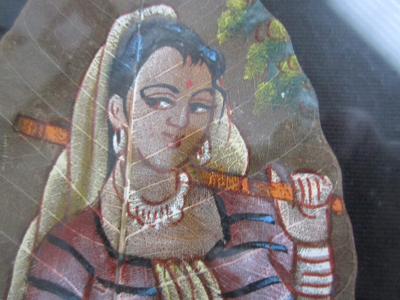 Best «look» on a Indian Pipal Leaf painting subject. Great detail and colors.