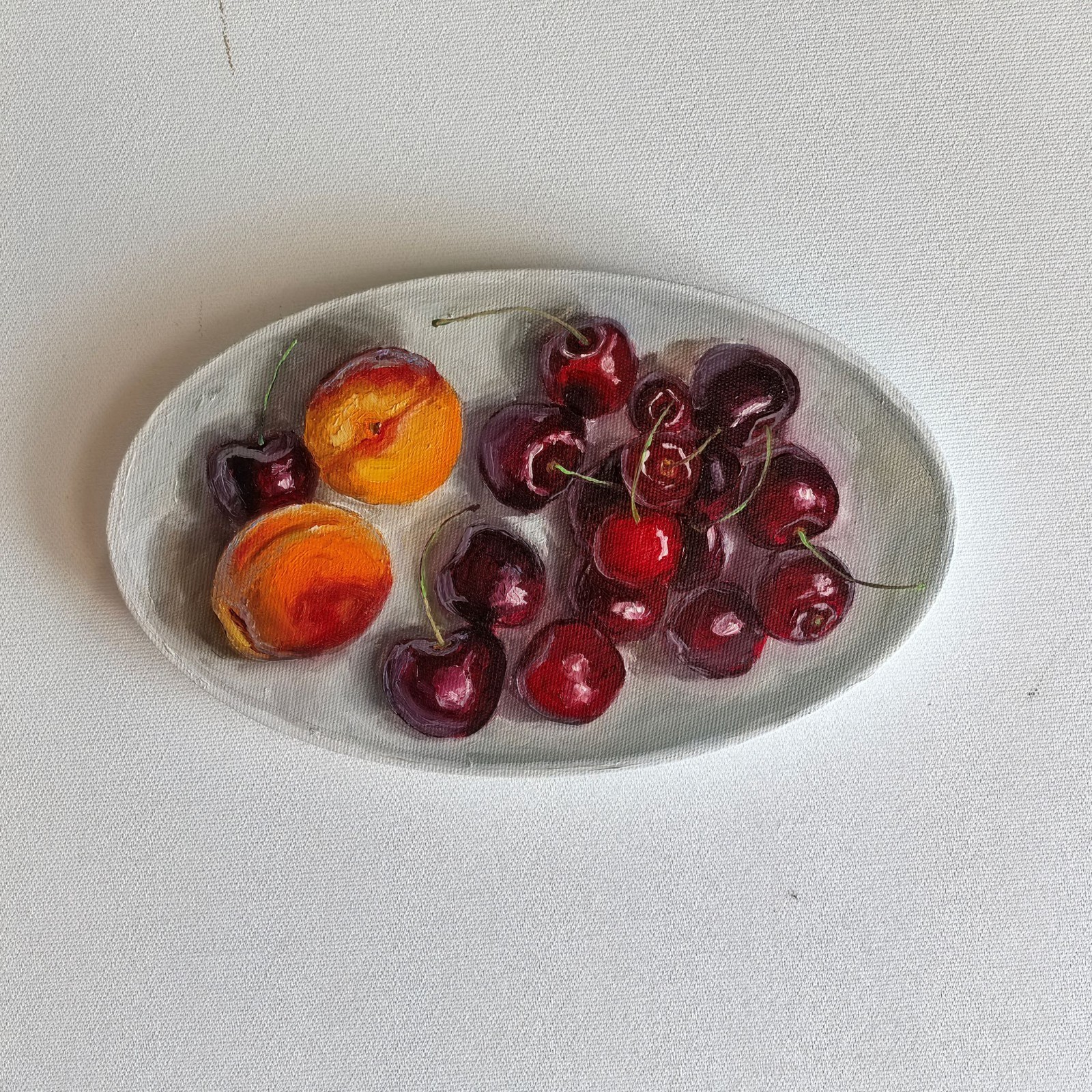 Apricot with cherry on porcelain plate still life 6×10»