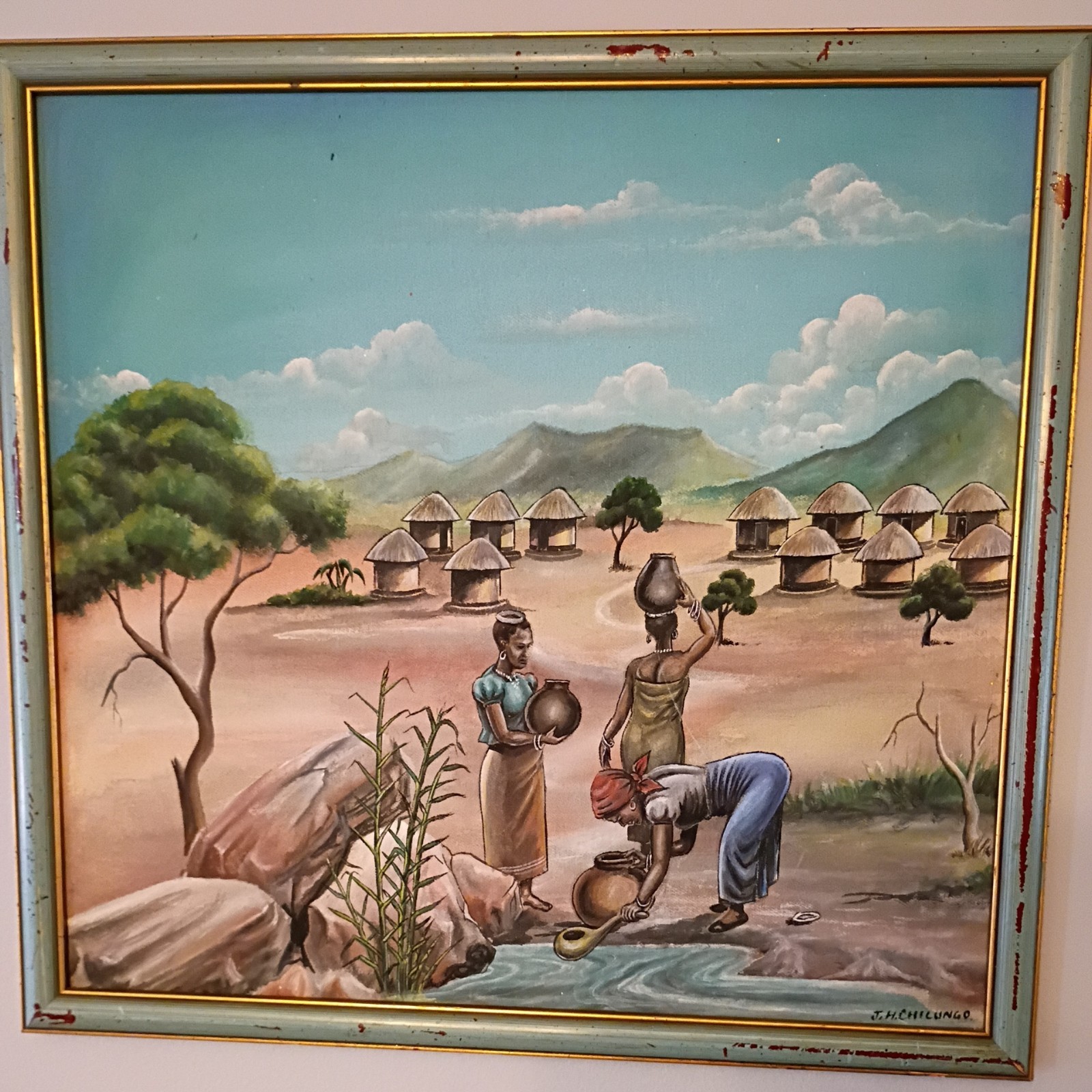 African Village Oil On Canvas Painting by J.H Chilungo 17 1/2 x16 1/4 H Framed