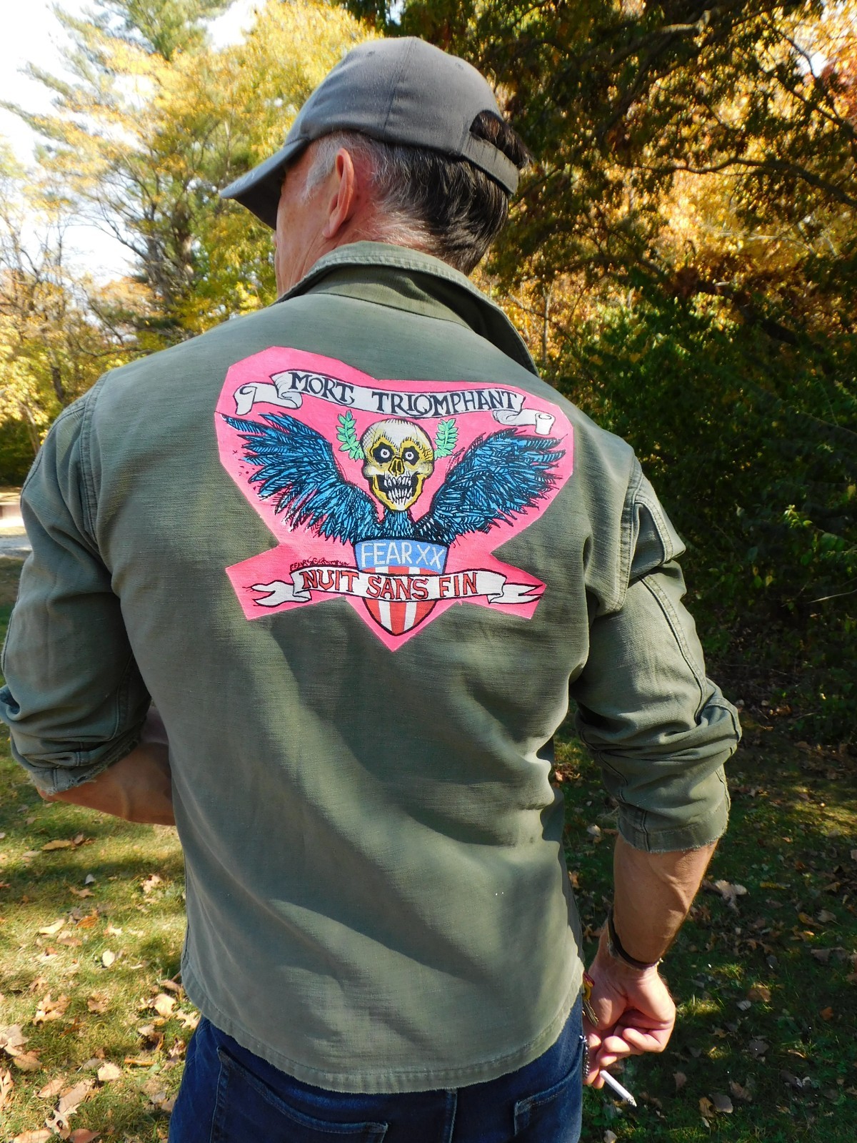 Original Art for sale by Artist Fearxx painted on old Army Shirt Punk Goth Skull