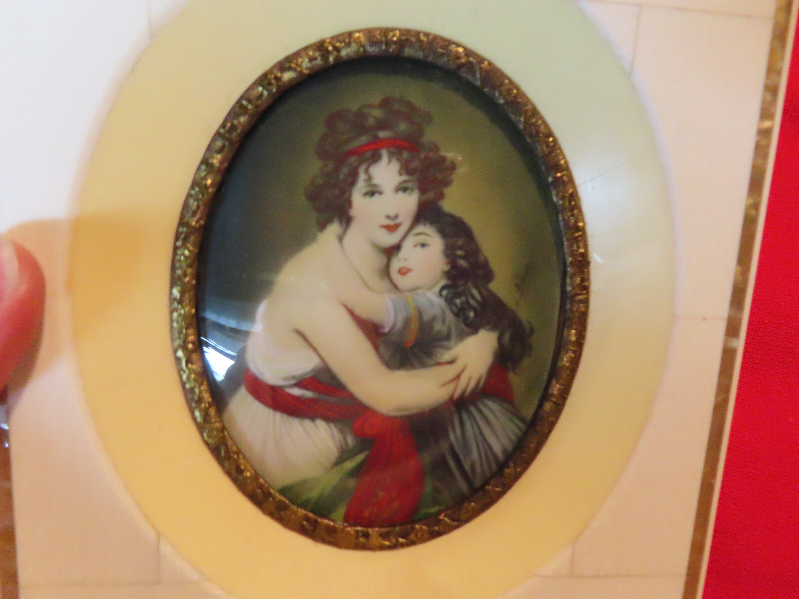 Miniature signed hand painted portrait on celluloid in celluloid frame, vintage