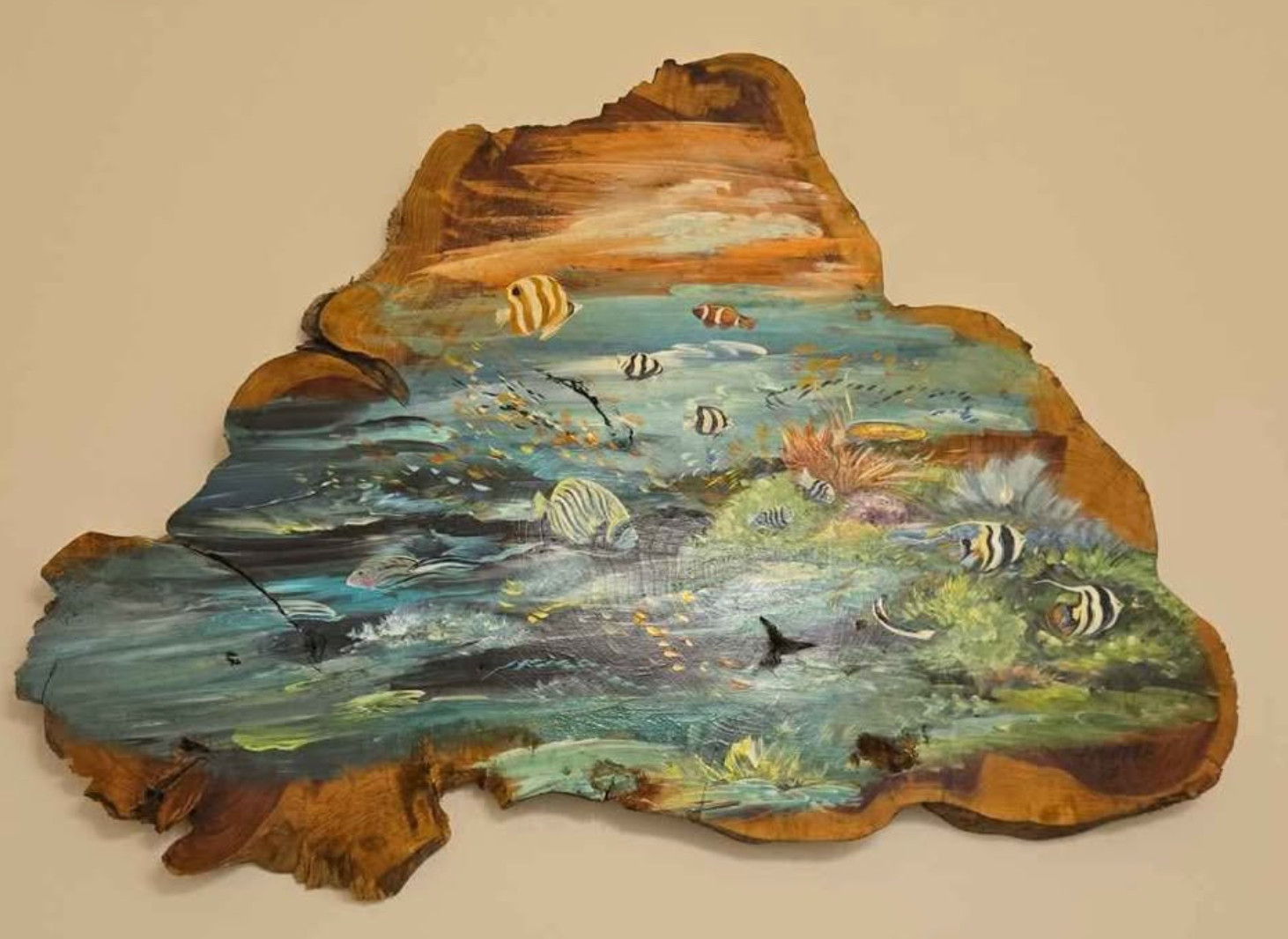 One of a kind commissioned artwork of cchool of fish on live edge wood