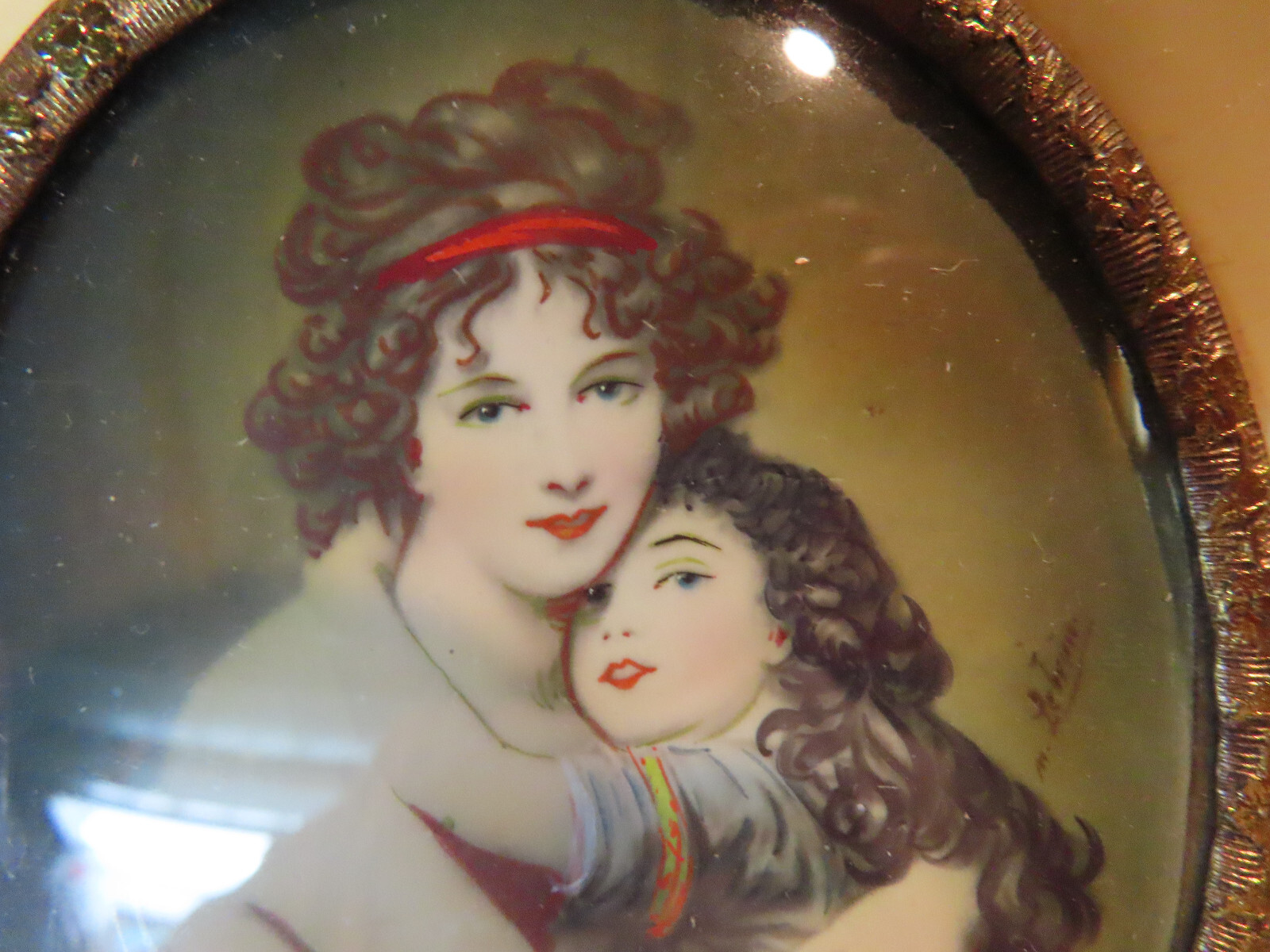 Miniature signed hand painted portrait on celluloid in celluloid frame, vintage