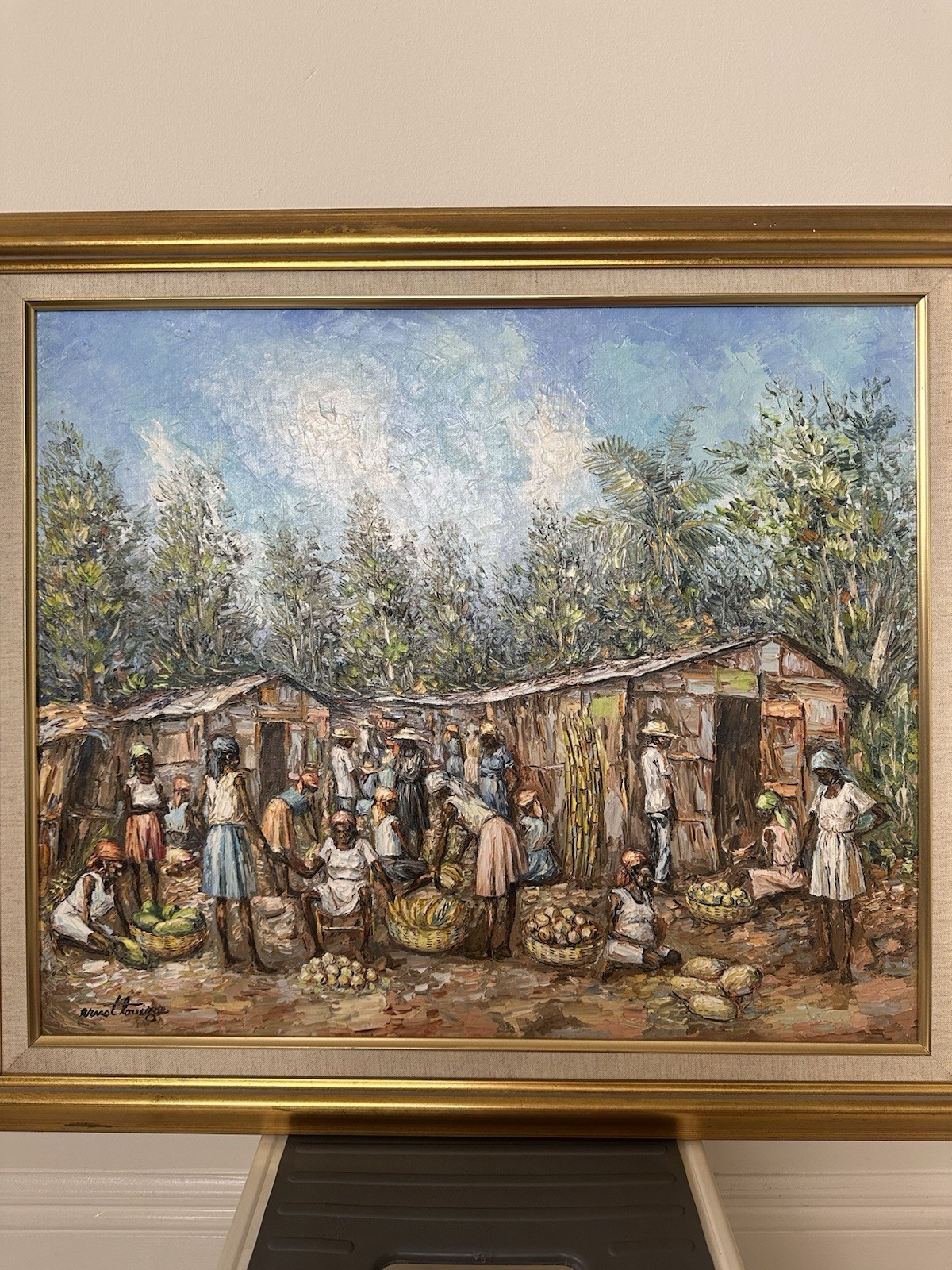 ERNST LOUIZOR Scene of an Haitian marketplace .Oil on canvas.24”x 30”.
