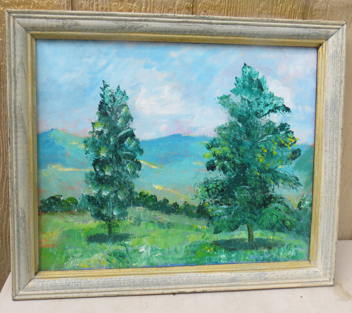 NICE FRAMED OIL ON BOARD LANDSCAPE IN SHADES OF GREEN AND BLUE