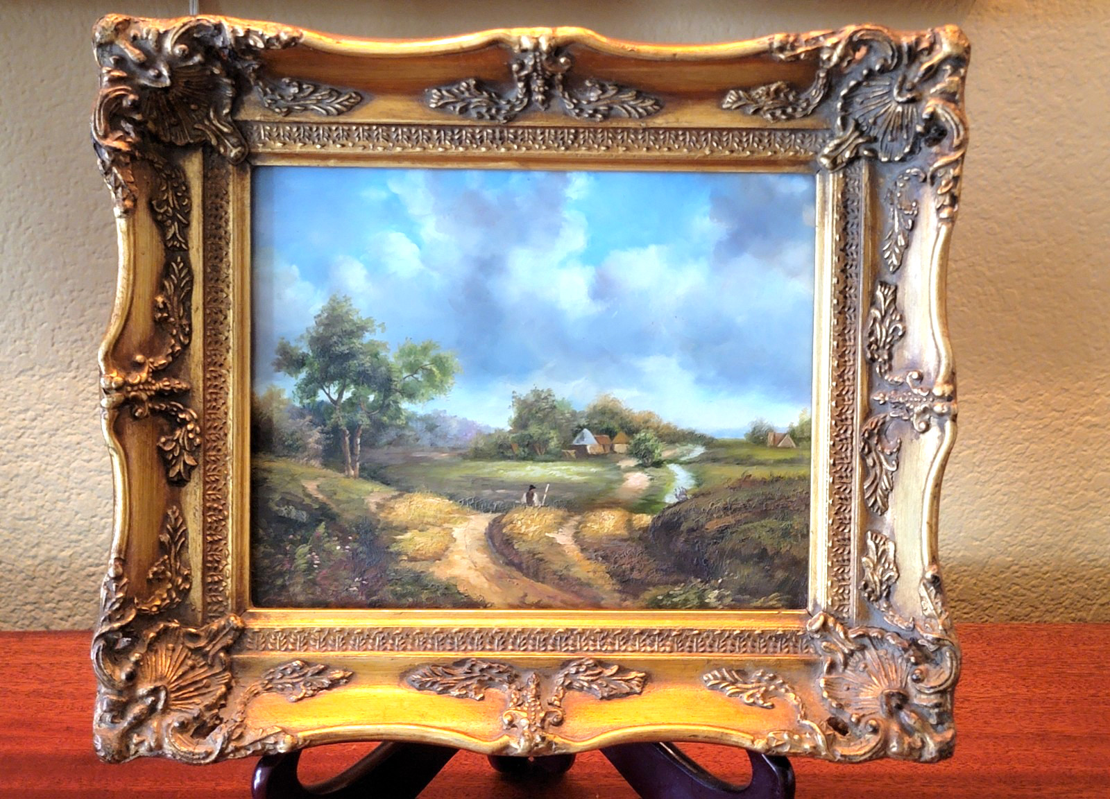 GILT FRAMED OIL ON BOARD PAINTING OF A BUCOLIC LANDSCAPE 14 X 12 UNSIGNED