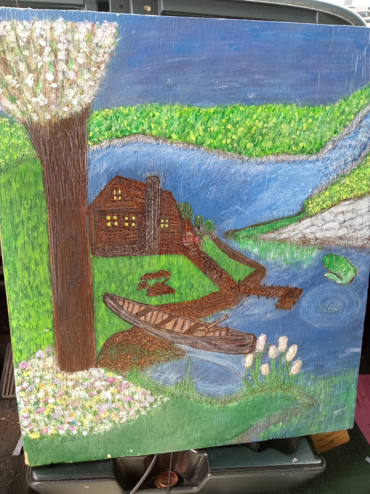 Hand drawn Wood burning art pyrography of cabin with lake and waterfall w/ color