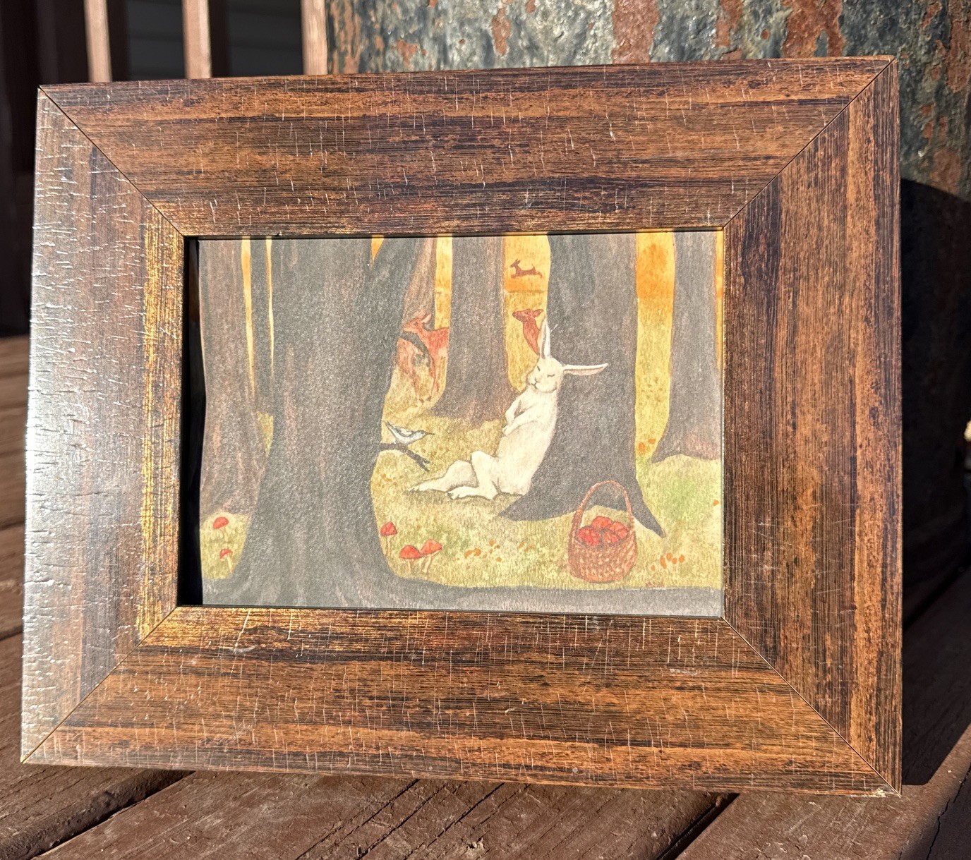 Wall decor vintage-inspired illustration of a white rabbit in a woodland scene.